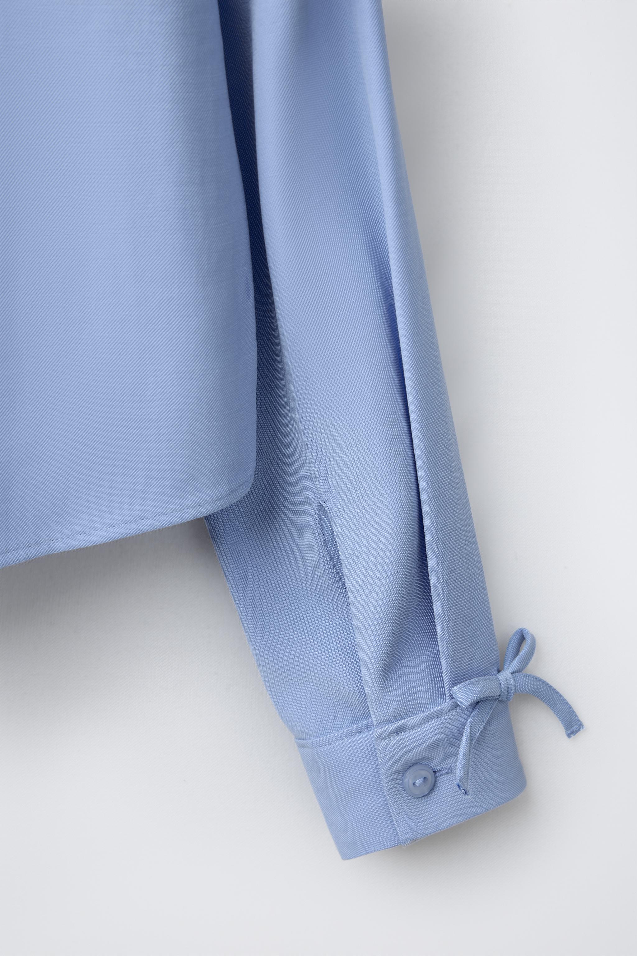 FLOWY SHIRT WITH BOWS